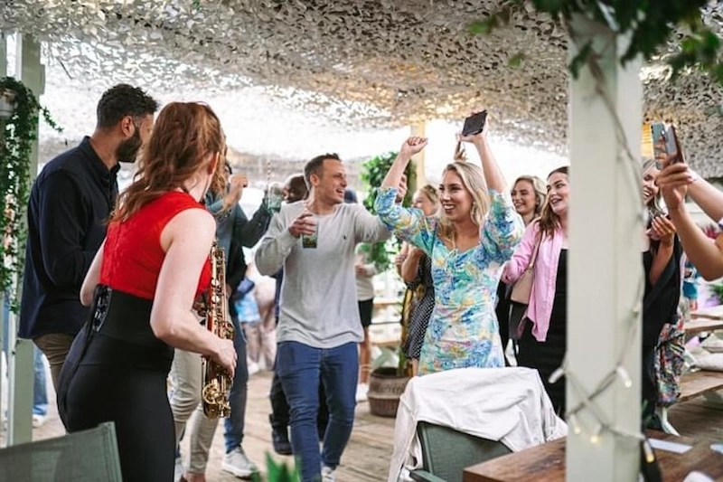 Live DJ sax performance at a wedding party