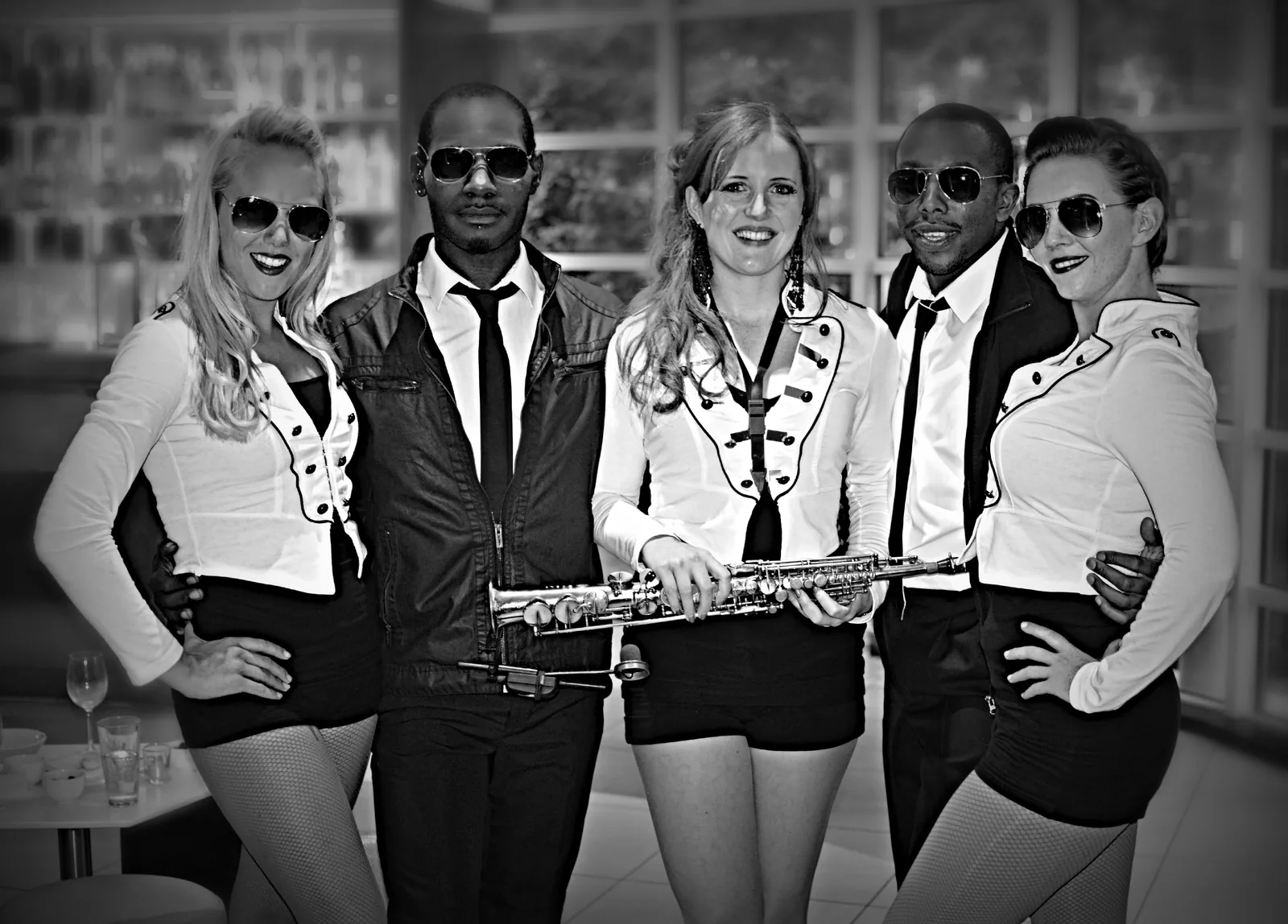 Project Secret saxophone and dancers group photo