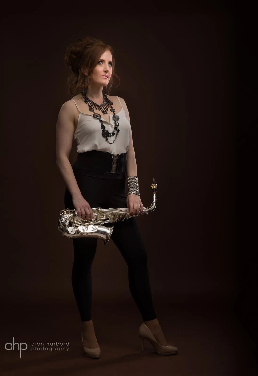 Sarah Saxophone portrait wearing a statement necklace