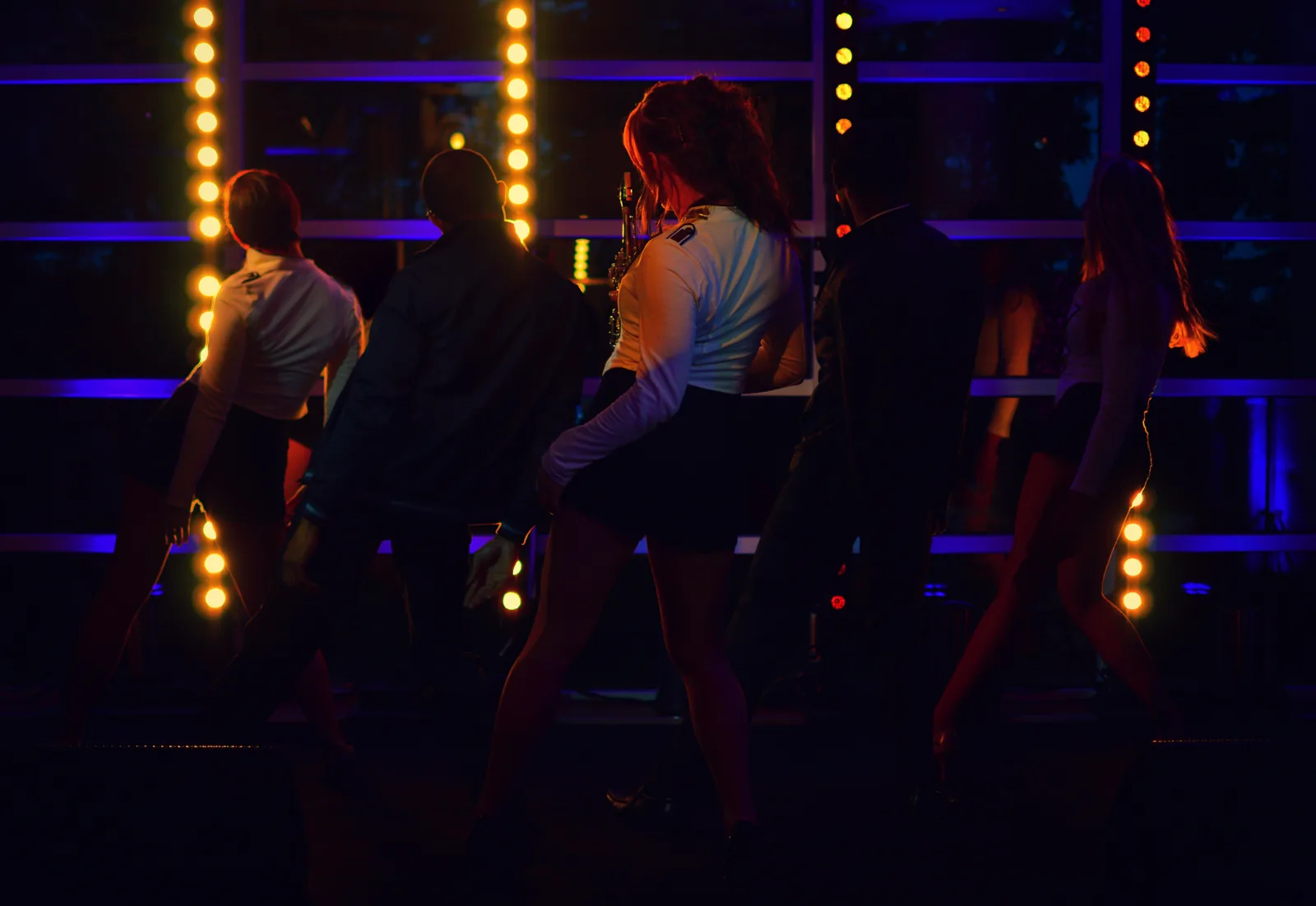 Saxophone with dancers, Project Secret show