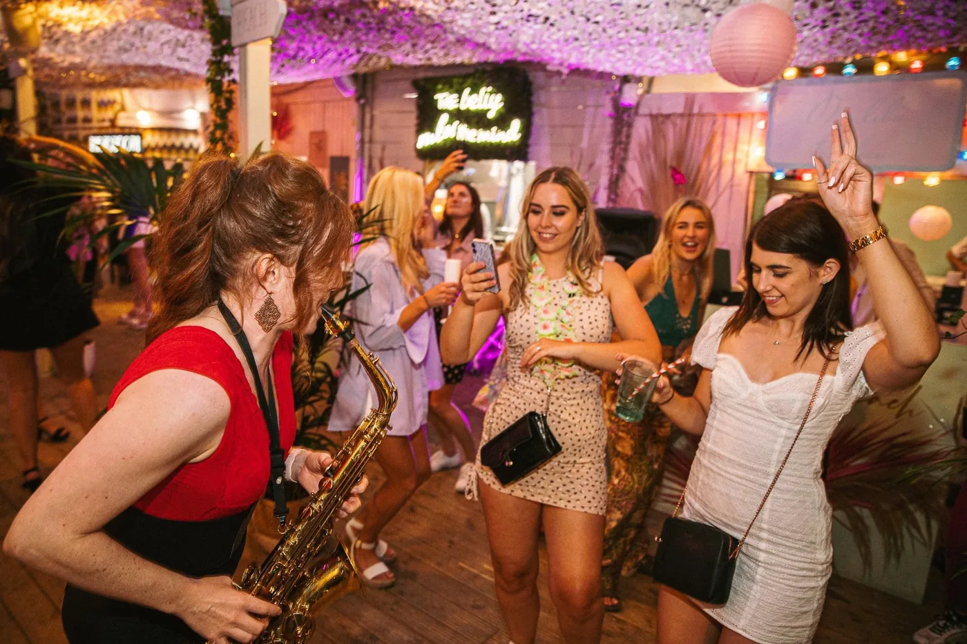 Sarah Saxophone playing live on the dancefloor — Evening Reception with DJ